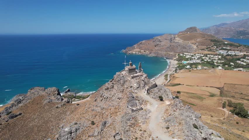 Aerial footage of the Church of Saint Paisios, located in the south coastline of Crete, Greece