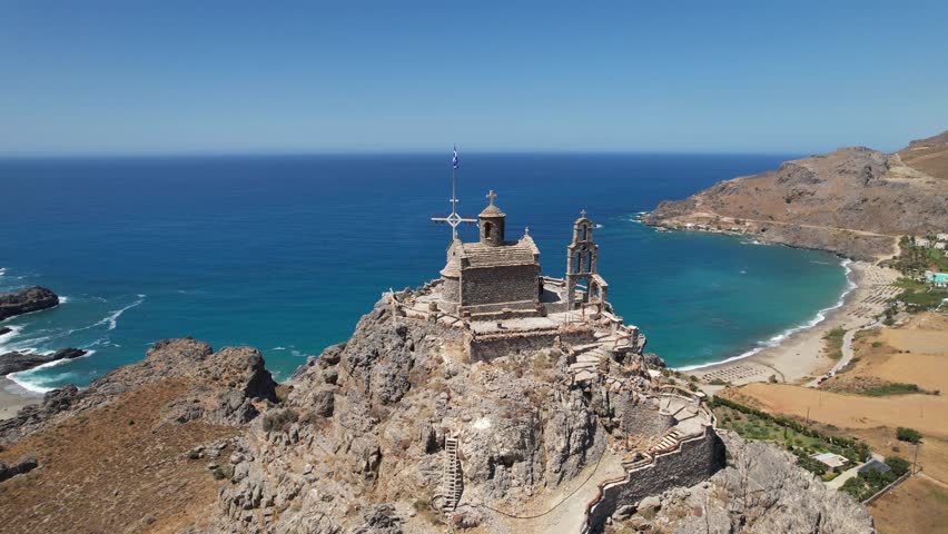 Aerial footage of the Church of Saint Paisios, located in the south coastline of Crete, Greece