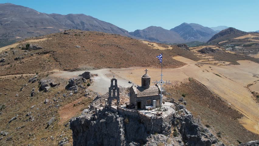 Aerial footage of the Church of Saint Paisios, located in the south coastline of Crete, Greece