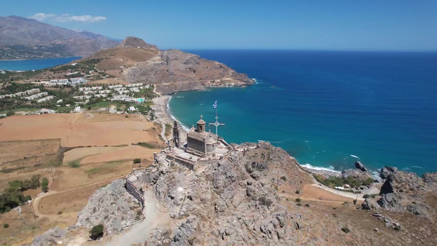 Aerial footage of the Church of Saint Paisios, located in the south coastline of Crete, Greece