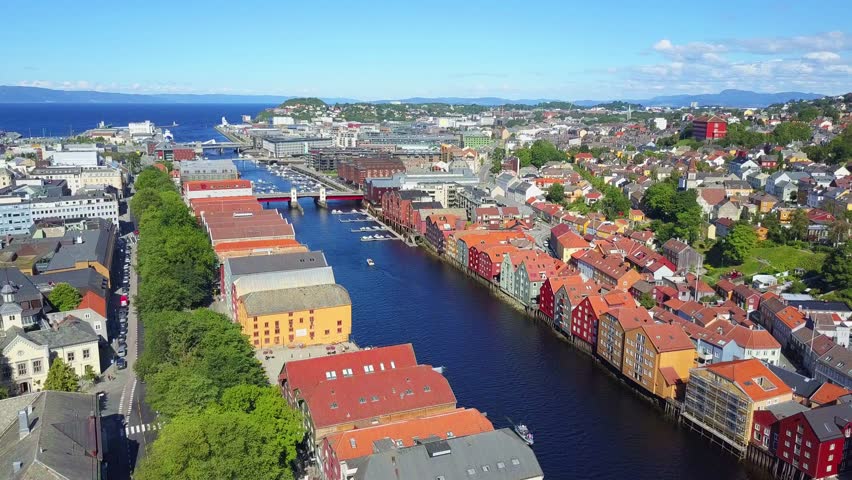 Colorful old houses at the Nidelva river embankment aerial view in the center of Trondheim town in Norway