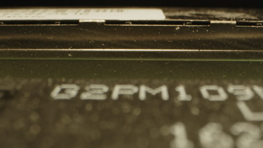 Fast dolly out of a circuit board revealing diodes and microchips on the board