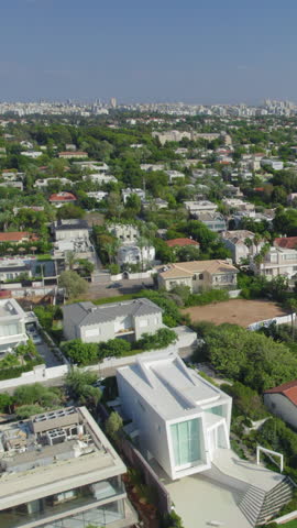 The most expensive neighborhoods that is close to the beach of Herzliya Pituach, Israel - Vertical video - the neighborhood attracts very rich families, investors, non-residents and developers