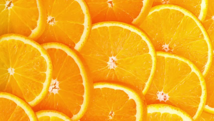 Orange fruit pattern. Orange slices close-up. Top view.