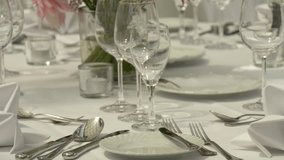 Floral Centerpiece at a White Table Setting - Powered by Shutterstock - Get 15% off with code: PIKWIZARD15