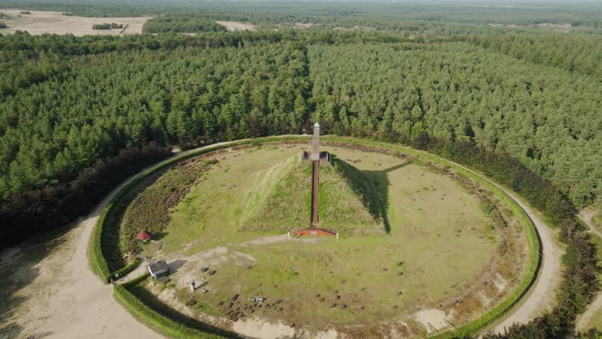 Aerial approach Pyramide Austerlitz, old historical landmark in the middle of natural area Utrechtse Heuvelrug, monument dedicated to Napoleon Bonaparte