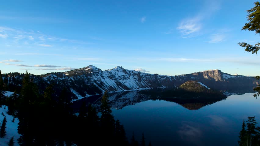 Crater lake national park in Oregon. Beautiful sunset and reflection on the water