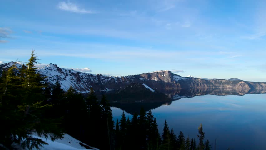 Crater lake national park in Oregon. Beautiful sunset and reflection on the water