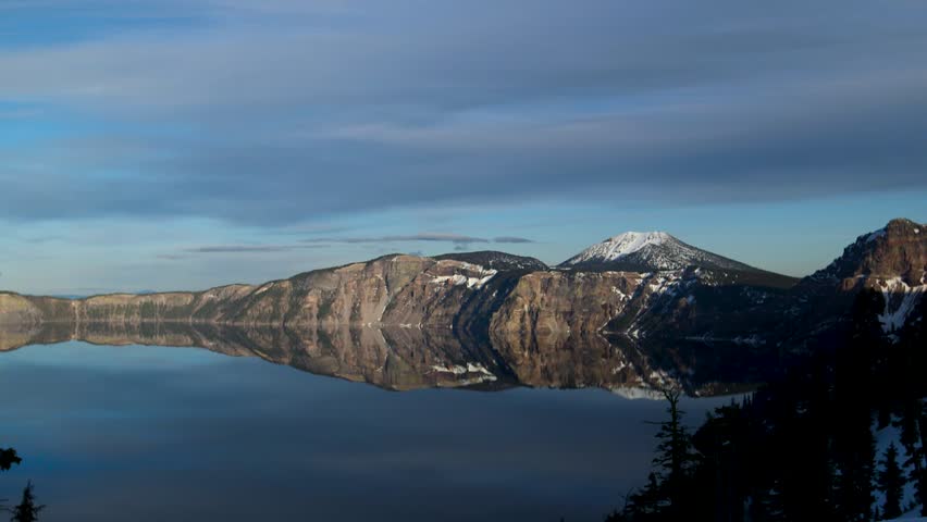 Crater lake national park in Oregon. Beautiful sunset and reflection on the water