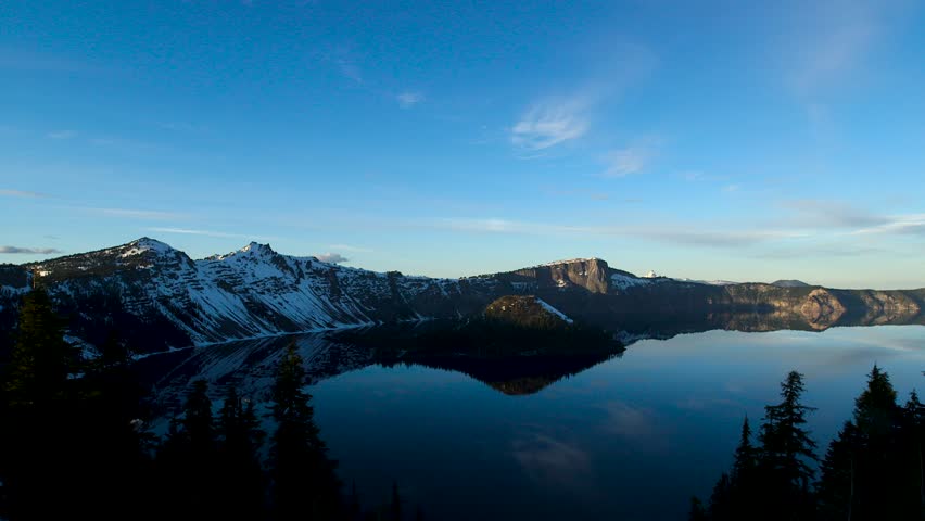 Crater lake national park in Oregon. Beautiful sunset and reflection on the water