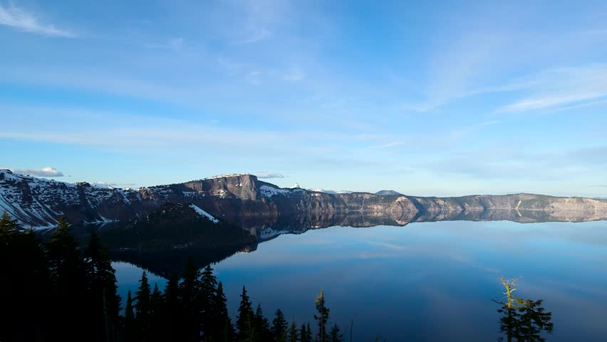 Crater lake national park in Oregon. Beautiful sunset and reflection on the water