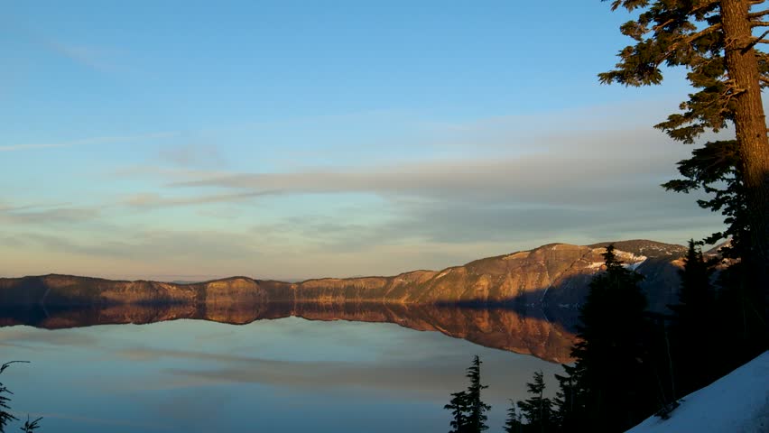 Crater lake national park in Oregon. Beautiful sunset and reflection on the water