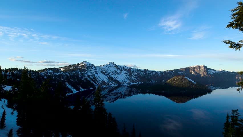 Crater lake national park in Oregon. Beautiful sunset and reflection on the water