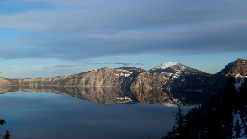 Crater lake national park in Oregon. Beautiful sunset and reflection on the water