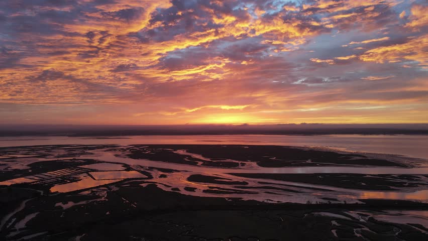 Sunrise with strong colours on the Sado river estuary