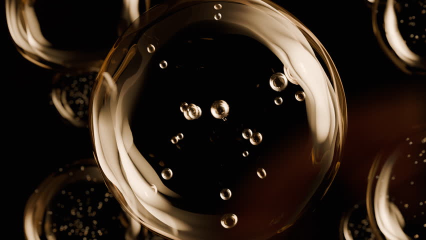 Golden serum liquid bubbles. Luxury beauty cosmetics macro 3D abstract background. Bio moisturizer essence gel or oil drops. Collagen fluid molecule. Moisturizing peptide face cream for skin lifting