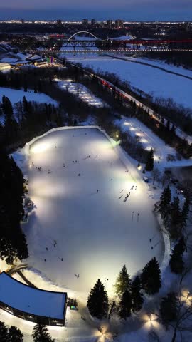 Ice skating on a cold, snowy evening in downtown Edmonton.