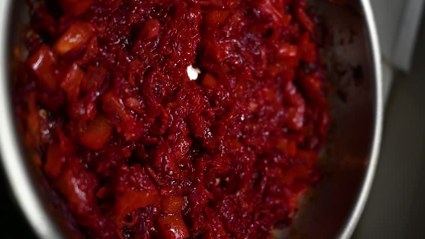 Cooking Borscht Base. Sauteing Beets, Carrots and Onions for Traditional Soup