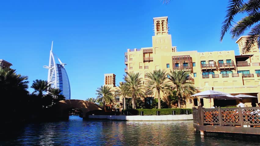 Souq Madinat Jumeirah with view of Burj Al Arab, Dubai. Traditional Arabian market with luxury 7-star hotel landmark in the United Arab Emirates.