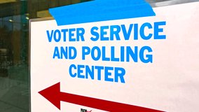 A “Voting Service Polling Center” sign with a bold arrow pointing outward, directing citizens toward their official polling place for in-person voting and civic participation on Election Day. - Powered by Shutterstock - Get 15% off with code: PIKWIZARD15
