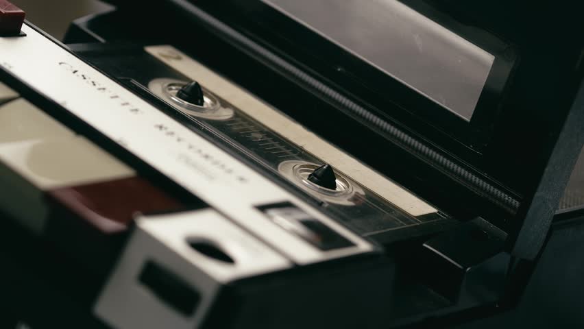 Cassette tape recorder playing CLOSE-UP angle