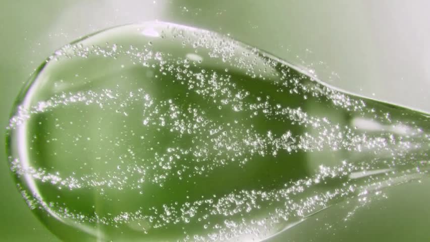 Aloe vera liquid for skin care, green cells, cosmetic moisturizer essence collagen liquid bubble molecules, body cream or oil. Personal healthcare and beauty skin concept,3d animation.