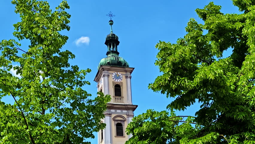 Bell Tower Of Karmelitenkloster Regensburg Monastery In Regensburg, Germany. Low Angle Shot