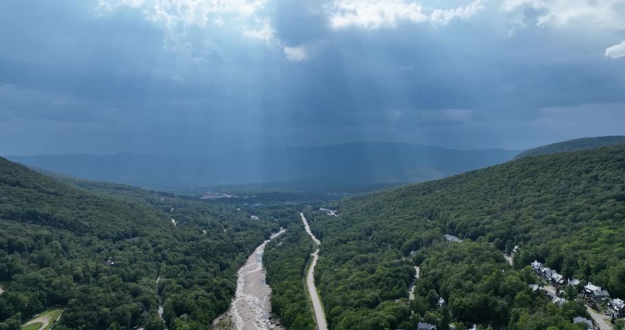 Drone view of the Kancamagus highway and White Mountains in New Hampshire on a cloudy day in summer