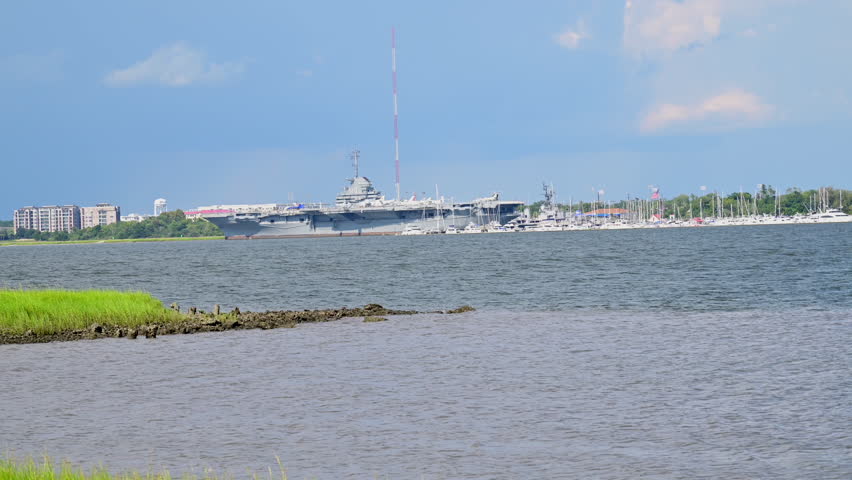 World War II USS Yorktown aircraft carrier docked in Charleston harbor serving as a museum.