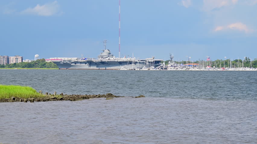 World War II USS Yorktown aircraft carrier docked in Charleston harbor serving as a museum.