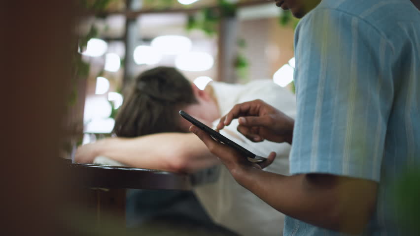 Vista glimpse of tablet screen illuminated by soft ambient light fingertip tapping vibrant icons on touchscreen interface gentle motion highlighting intuitive digital interaction amid soft indoor blur - Powered by Shutterstock - Get 15% off with code: PIKWIZARD15