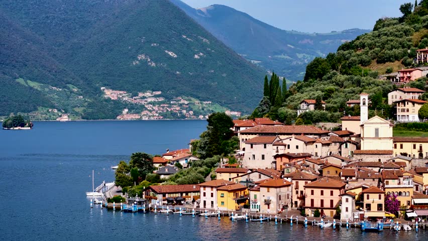 Peschiera Maraglio in Monte Isola, Lake Iseo or Lago d'Iseo. Beautiful island in Lombardy, Italy. Aerial 4K drone video footage