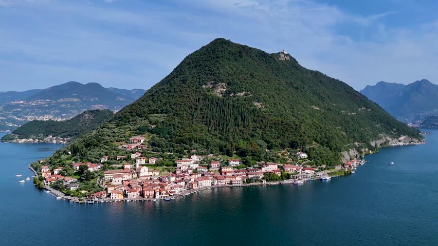 Monte Isola in Lake Iseo or Lago d'Iseo. Beautiful island in Lombardy, Italy. Aerial 4K drone video footage