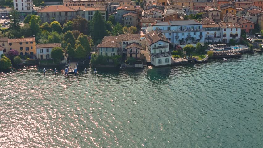 Sulzano town in Monte Isola, Lake Iseo or Lago d'Iseo. Beautiful island in Lombardy, Italy. Aerial 4K drone video footage