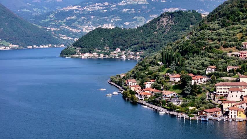 Peschiera Maraglio in Monte Isola, Lake Iseo or Lago d'Iseo. Beautiful island in Lombardy, Italy. Aerial 4K drone video footage