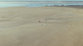 Come with me to the widest Romo Sonderstrand Beach with experiencing the wind surfing action at the sand beach during low tide phase - Powered by Shutterstock - Get 15% off with code: PIKWIZARD15