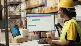 Black warehouse worker managing inventory logistics with AI virtual assistant to help updating shipping labels for accurate delivery and order processing. Online shopping retail activity. Camera B. - Powered by Shutterstock - Get 15% off with code: PIKWIZARD15