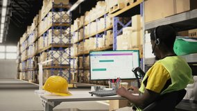 Black call center operator assisting a client with order mix up problems, verifying parcel status on package tracking software in the warehouse facility. Customer service dispatch support. Camera A. - Powered by Shutterstock - Get 15% off with code: PIKWIZARD15