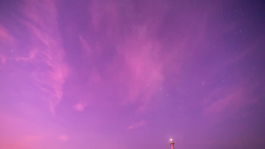 Time lapse of the Milky Way rising above a lighthouse on a small island, clouds moving in and obscuring the sky.
Lanta Lighthouse is the southernmost point of the island and is a popular landmark.