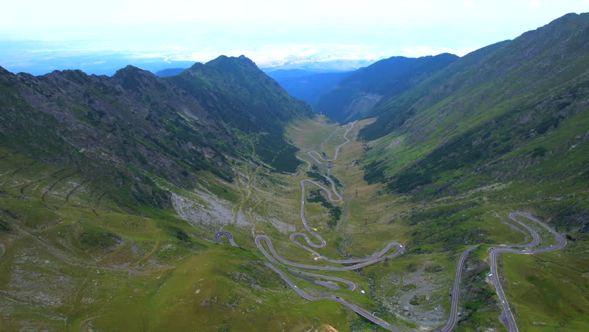 Romanian mountainous road of Transfagarasan. Aerial dolly out