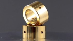 Bearing journal turbocharger, Sintered bronze bushing with internal holes.on rotating display. - Powered by Shutterstock - Get 15% off with code: PIKWIZARD15