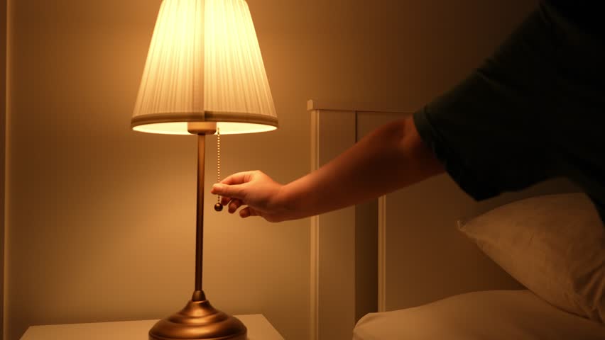 Switching off the cozy bedside light marks the start of a peaceful night, supporting better sleep hygiene, energy saving, relaxation rituals, digital detox, and a calming pre-bed atmosphere.

