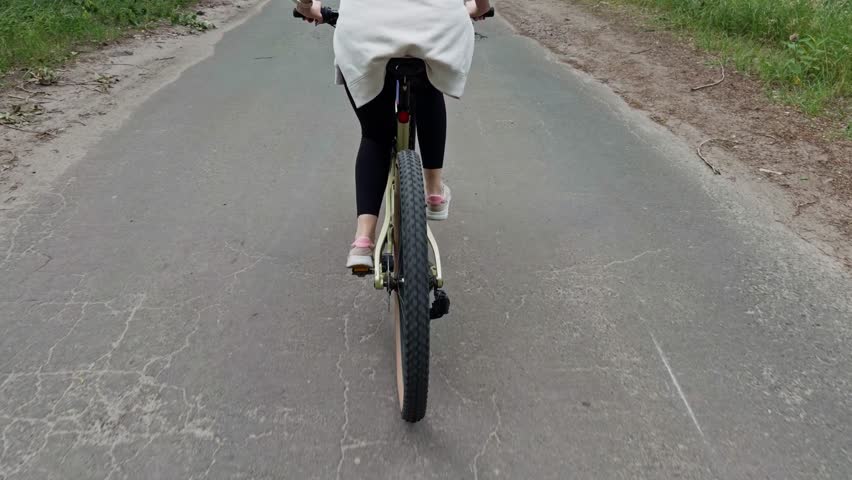 Cyclist Riding Modern Mountain Bike On Forest Trail. Showing Speed, Strength And Control During Outdoor Training. Motion Energy And Determination. Endurance Adventure. Active Recreation Sport Activity