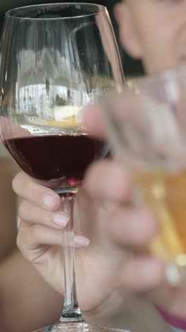 Man Toasting with Whiskey at Social Event