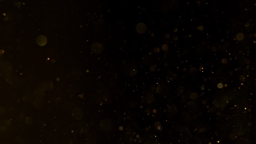 Super Slow Motion Shot of Glittering Golden Background at 1000fps.
