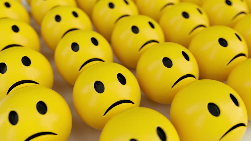 Emoticon Expression Contrast of Yellow Sad Faces and Unique Blue Happy Face, Showcasing Individuality, Positivity, and Emotion in Striking Pattern of Smiley and Sad Faces