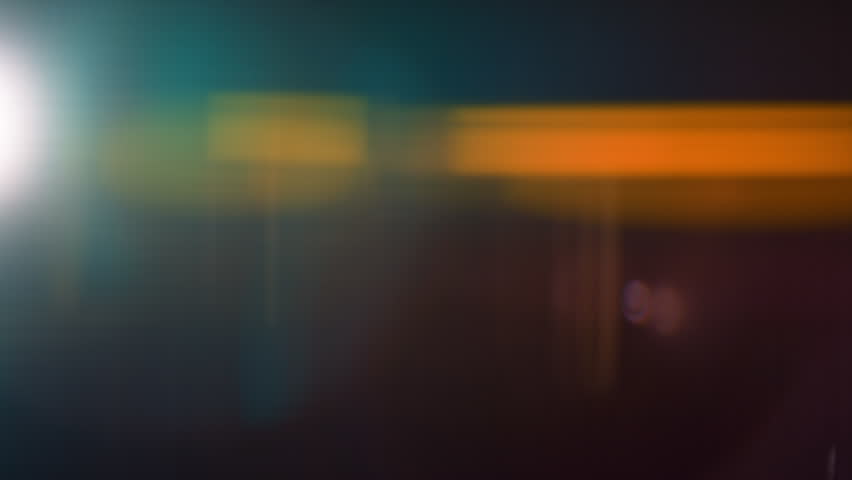 Real Shooted Cinematic Lens Flare Overlay on Black Background at 1000fps Slow Motion.