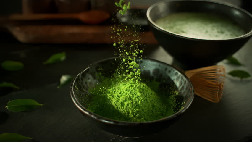 Super Slow Motion Shot of Falling Matcha Powder into a Bowl with Camera Motion at 1000fps.