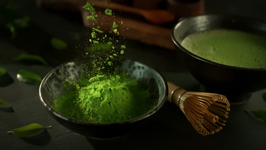 Super Slow Motion Shot of Falling Matcha Powder into a Bowl with Camera Motion at 1000fps.