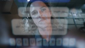 POV from Phone Screen: Female Employee Wearing Headset Using Smartphone, Scrolling and Chatting in Social Networks. In the Background, Diverse Loaders Working in Logistics Retail Warehouse at Night. - Powered by Shutterstock - Get 15% off with code: PIKWIZARD15